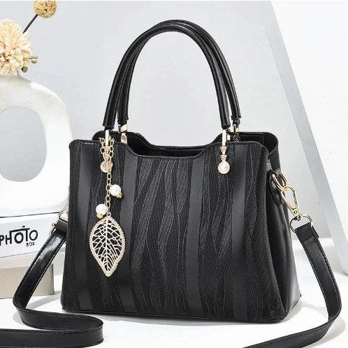 Handtasche aus PU-Kunstleder mit Blatt-Anhänger
