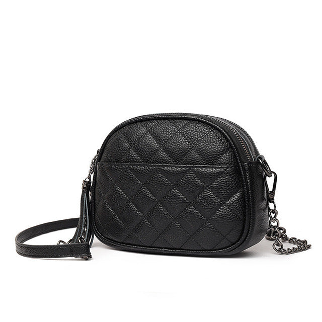 Quilted Leather Oval Crossbody Bag