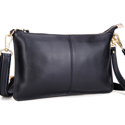 Crossbody-Clutch aus Kunstleder