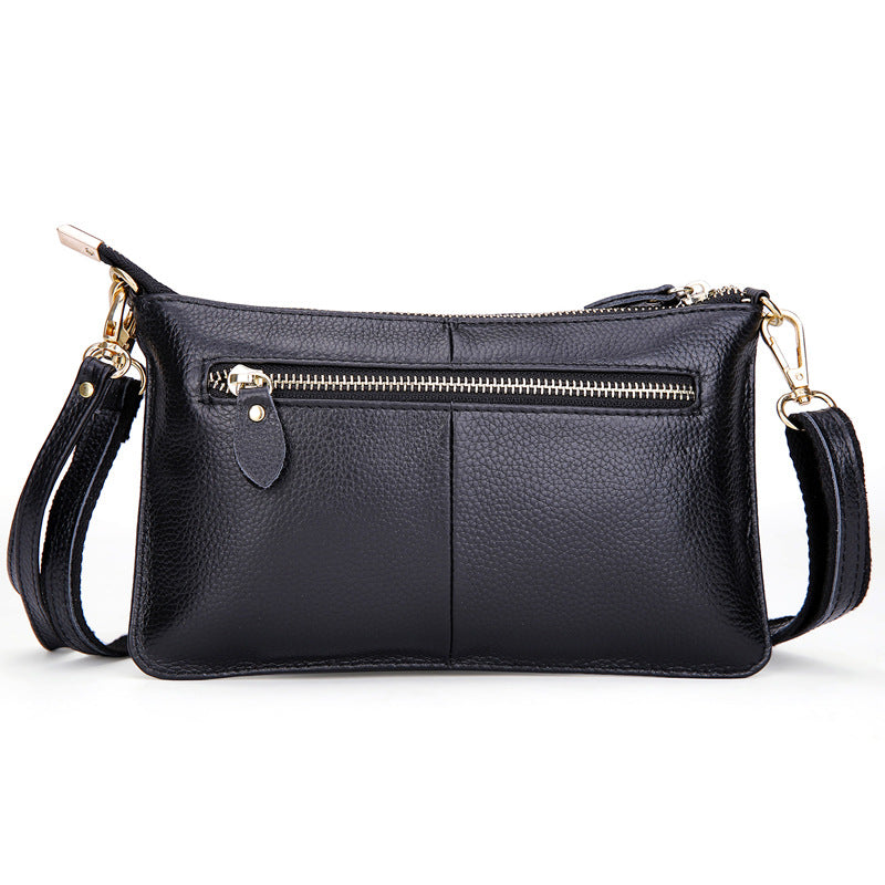 Crossbody-Clutch aus Kunstleder