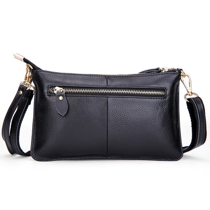 Crossbody-Clutch aus Kunstleder