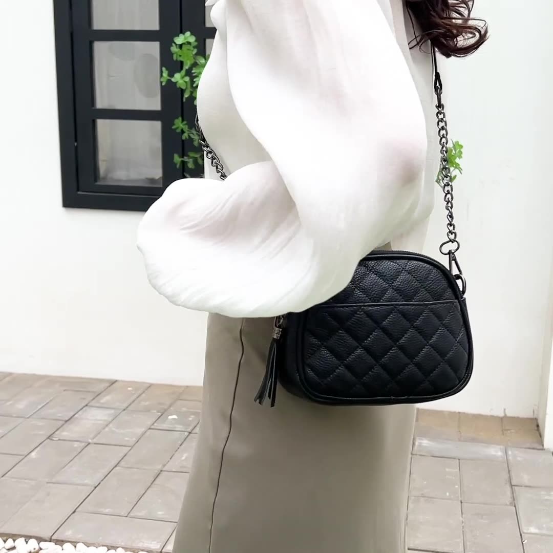 Quilted Leather Oval Crossbody Bag