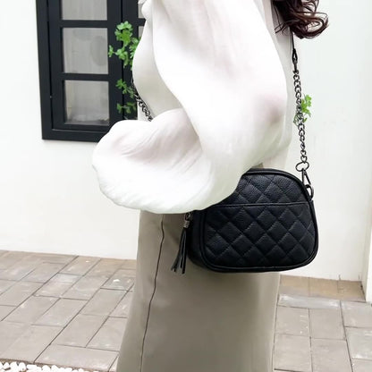 Quilted Leather Oval Crossbody Bag